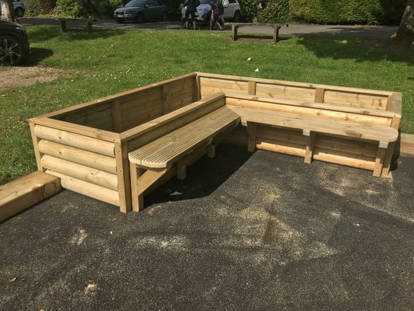 Wooden Corner Planter And Seating