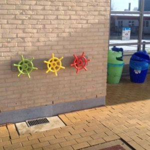 Different Coloured Wheels On Wall
